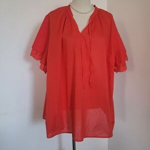 Women's Red Blouse  with Eyelet Sleeves,used in good condition.